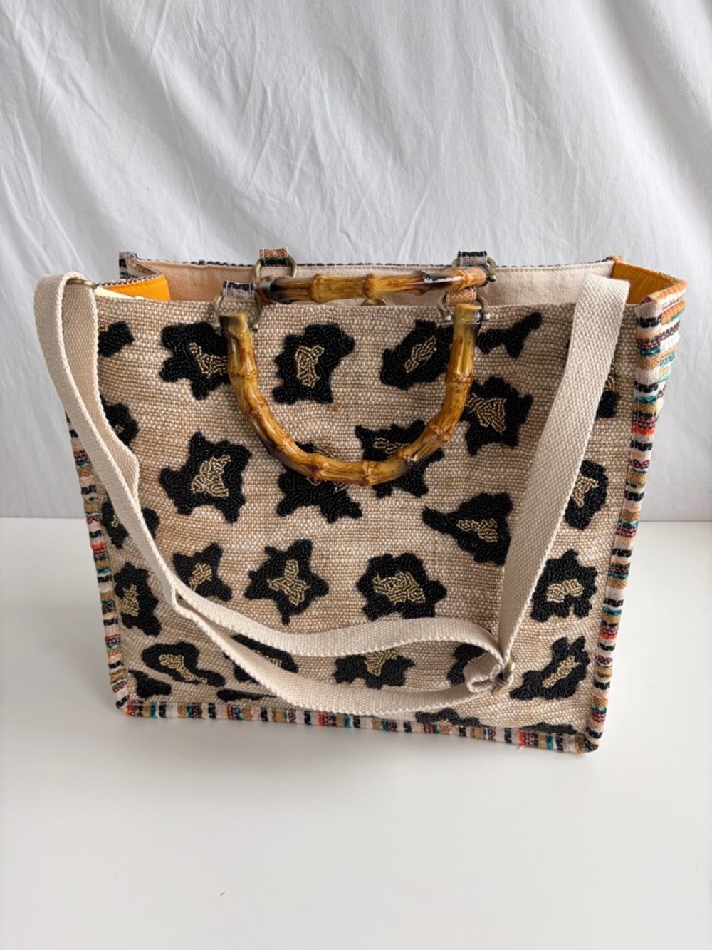 America & Beyond Luxe Leopard Tote Bag
Beaded Bamboo Handles Beige/Black/Orange - Picture 7 of 17